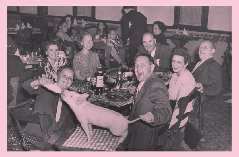 Michel Campeau | Playing with food, posing with a piglet at dinner